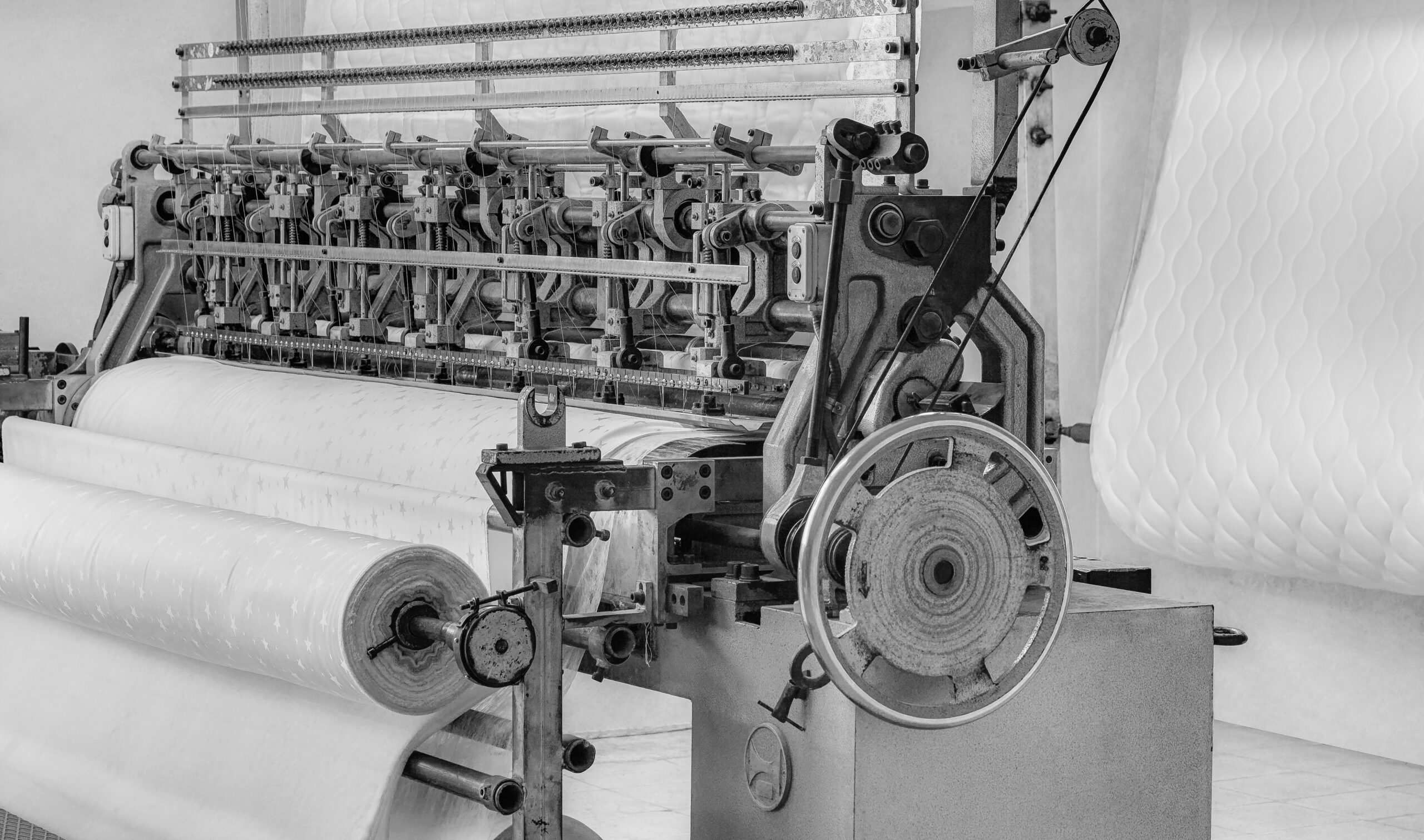 Quilting machine, mattress production in the factory.